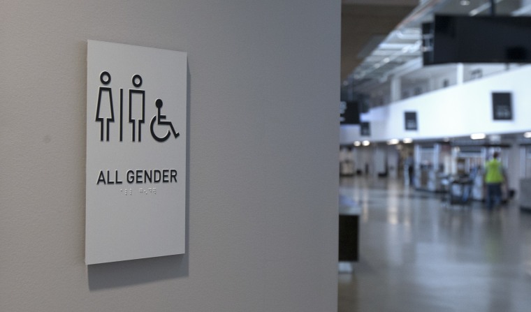 A sign marking an all-gender restroom is seen at the new Golden 1 Center, Thursday, Sept. 29, 2016, in Sacramento, Calif.