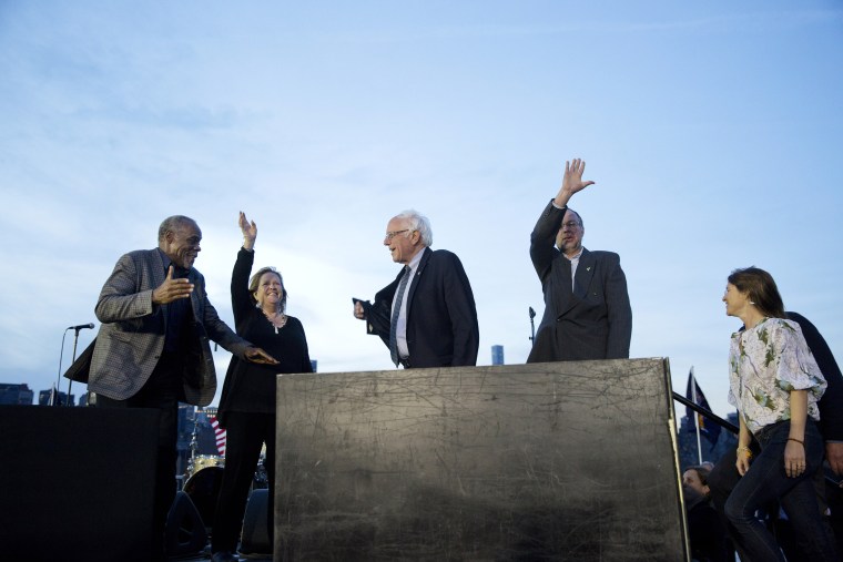 Image: Actor Danny Glover greets Senator Bernie Sanders 