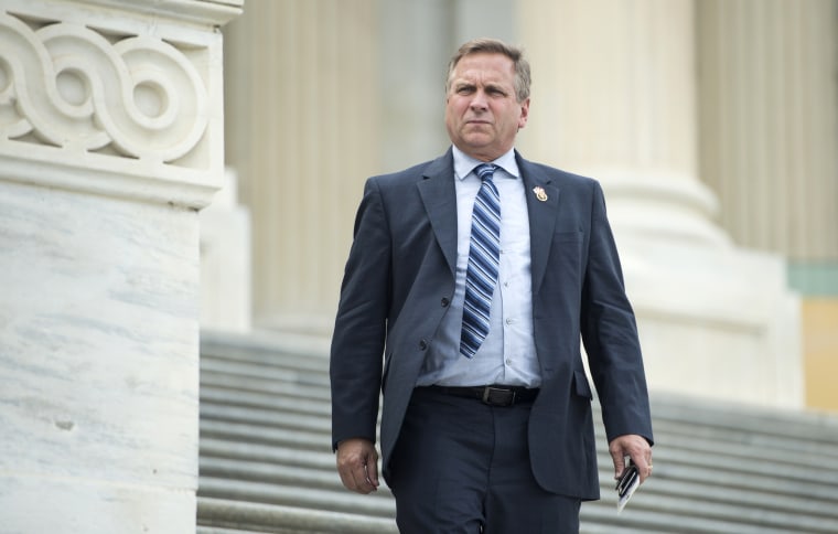 Image: Rep. Mike Bost, R-Ill., walks down the House steps after a vote on July 15, 2015.