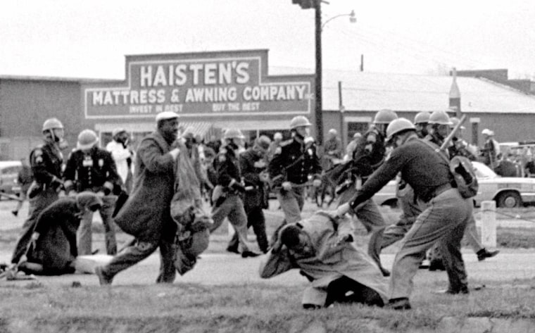 Image: Alabama state troopers swing nightsticks to break up a civil rights voting march in Selma, Alabama, March 7, 1965.