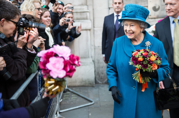 Queen Elizabeth II uses key accessory to end conversations - pictures