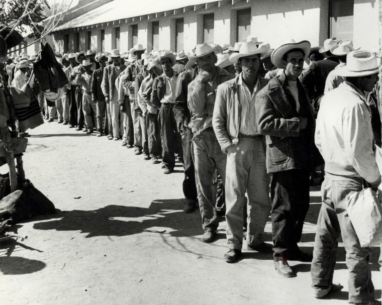 Image: Workers waiting in line to be contracted at the Rio Vista Farm Reception Center in Sacorro, Texas.