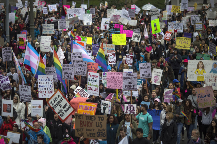 Image: Women march during the International Women's Day March and Rally