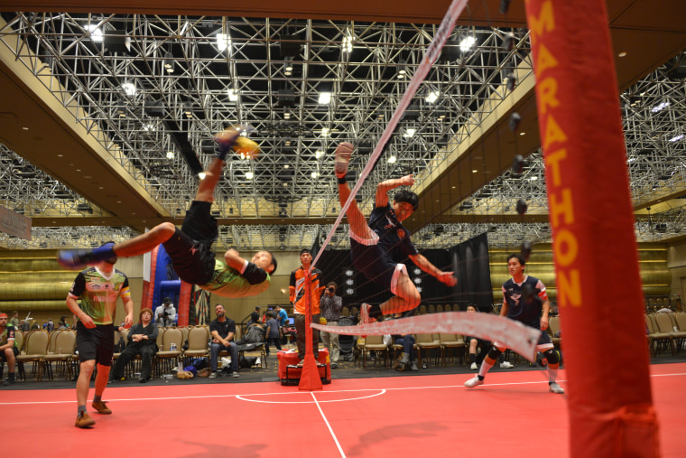 Sepak Takraw of USA's White Dragon Team from Minnesota, wearing black, playing against a Karen-American team from Phoenix, Arizona in red at the Skillcon Sepaktakraw Open in Las Vegas, December 2016.