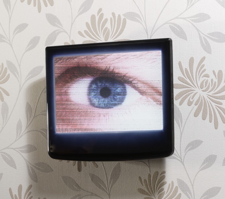 Image: Eye on television screen