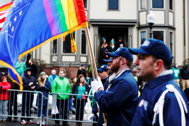 Image: FILE PHOTO - The color guard for LGBT veterans group OutVets marches down Broadway during the St. Patrick's Day Parade in South Boston