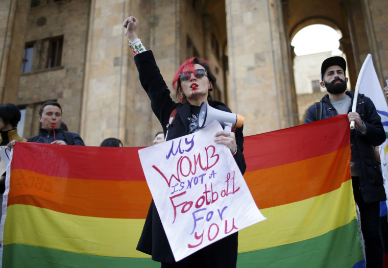 Image: People attend rally to mark International Women's Day in Tbilisi