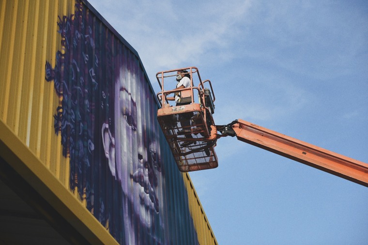 A young gallery patron poses outside of Studio BE in New Orleans