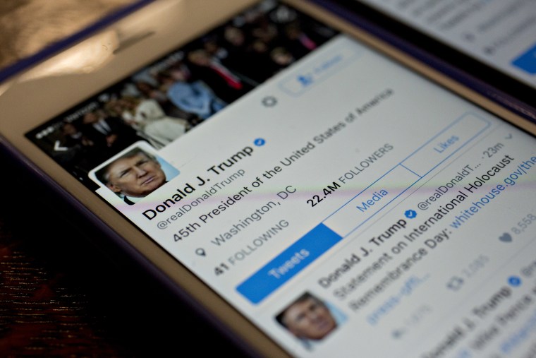 Image: The Twitter Inc. accounts of U.S. President Donald Trump, @POTUS and @realDoanldTrump, are seen on an Apple Inc. iPhone
