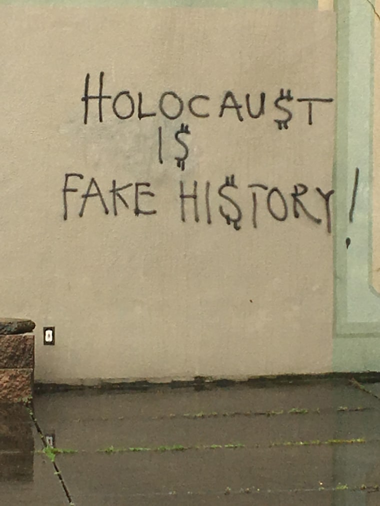 Image: Holocaust denying graffiti was spray-painted on one of Seattle's largest synagogues, Temple De Hirsch Sinai Friday morning.