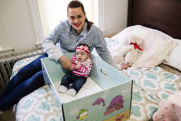 Image: Dolores Peterson and her 3-month-old daughter, Ariabella