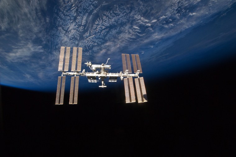 Image: The International Space Station with the Earth behind it