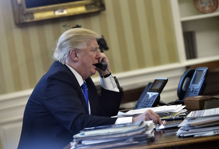 Image: Donald Trump speaks on phone with Angela Merkel on Jan. 28, 2017