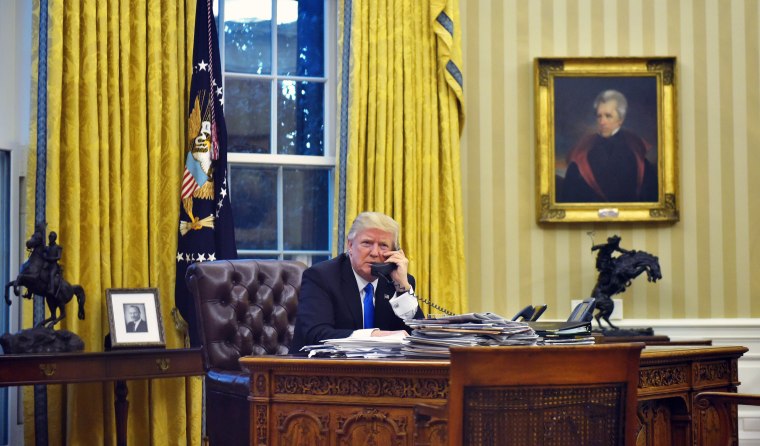 Image: President Donald Trump speaks on the phone with Australia's Prime Minister Malcolm Turnbull