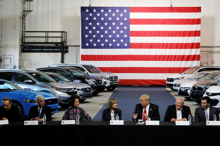 Image: Trump and Chao talk with auto industry leaders at the American Center for Mobility in Ypsilanti Township