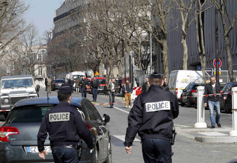 Image: French police secure the scene of the letter bomb