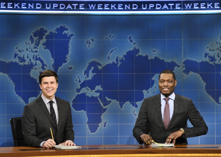 Colin Jost and Michael Che, right, anchor the Weekend Update segment of "Saturday Night Live" in New York.