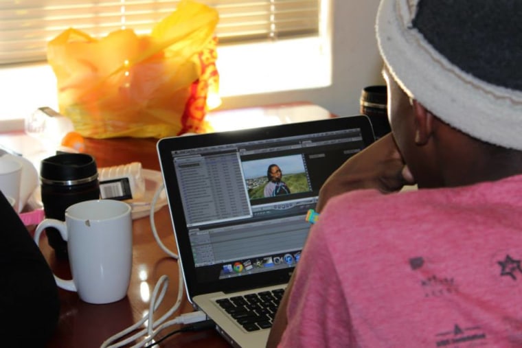 An Equal Education activist editing their short documentary