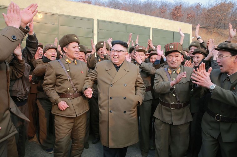 Image: Kim Jong-Un (center) inspects the ground jet test of a newly developed high-thrust engine