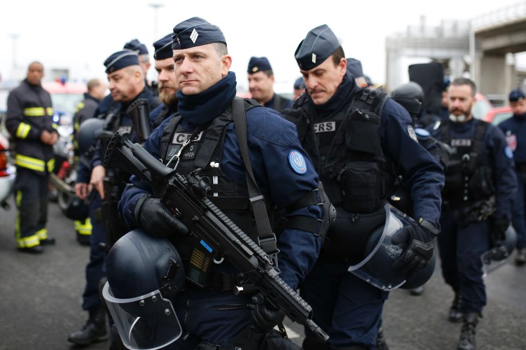Image: French policemen secure the area
