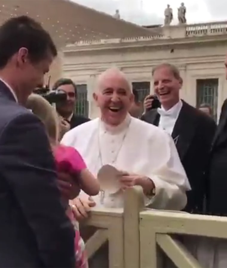 Little girl grabs pope's hat