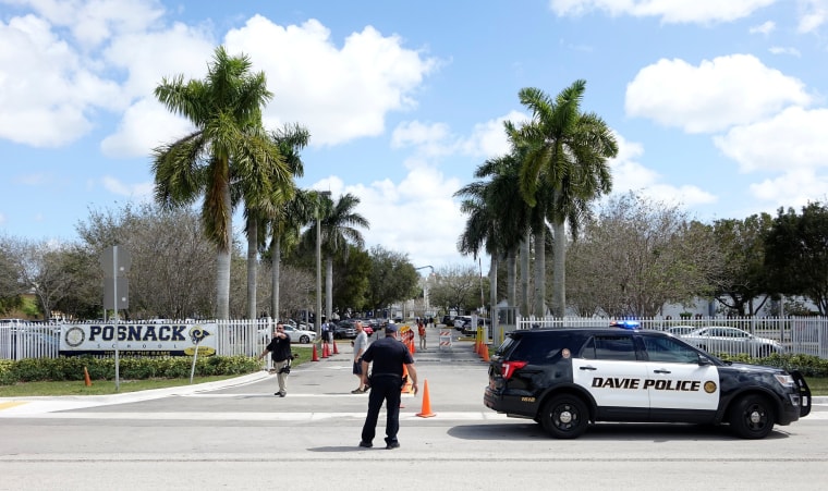 Image: Police vehicles are seen outside the David Posnack Jewish Day School after the second bomb threat in a month was reported in Davie, Florida, U.S. March 7, 2017.  REUTERS/Andrew Innerarity