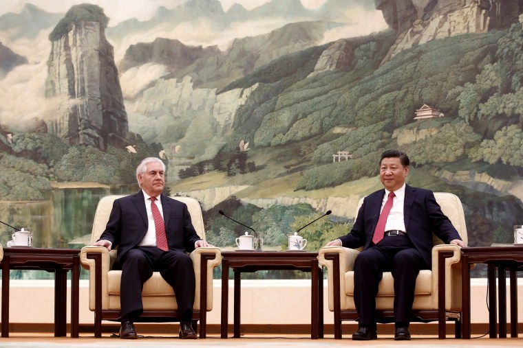Image: China's President Xi Jinping (right) meets with Secretary of State Rex Tillerson