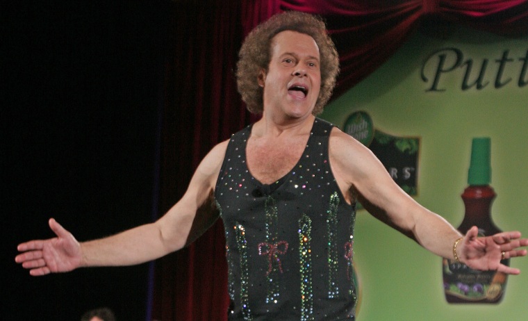 Richard Simmons speaks to the audience before the start of a fashion show at Grand Central Terminal in New York in 2006.
