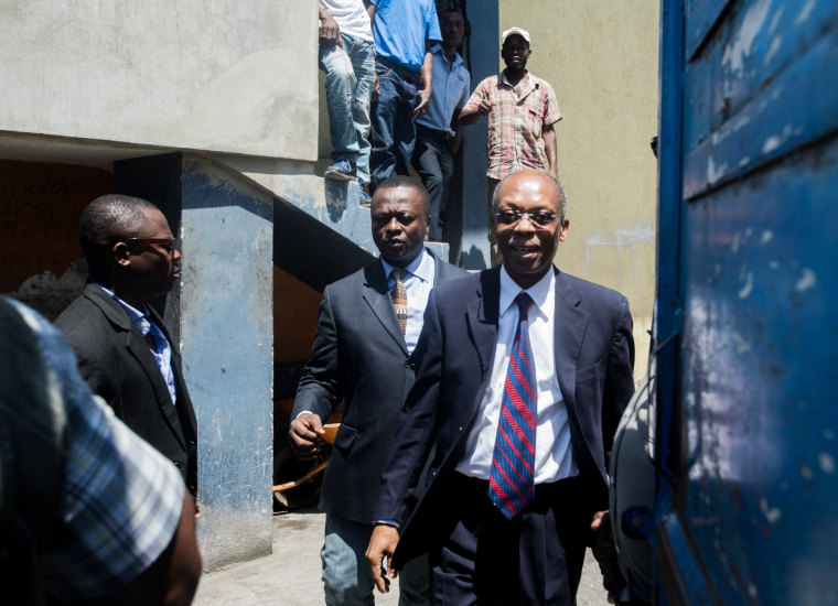 Image: Former Haitian President Jean-Bertrand Aristide makes a rare public appearance