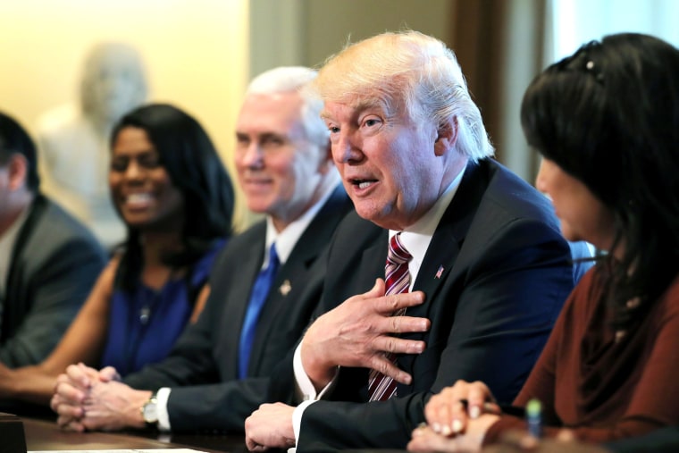 Image: Trump attends a meeting with the Congressional Black Caucus Executive Committee at the White House in Washington