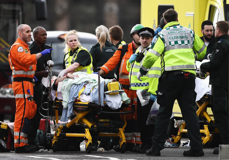 Image:  A member of the public is treated by emergency services