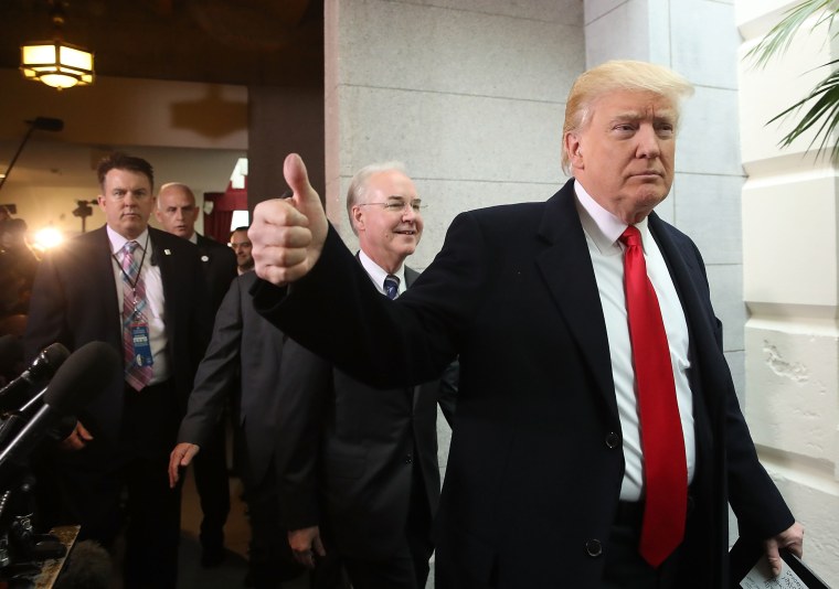 Image: President Donald Trump gives a thumbs up alongside and Health and Human Services Secretary Tom Price