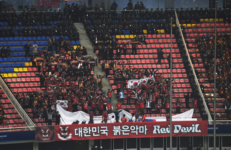 Image: Police and South Korea fans during World Cup qualifier on March 23, 2017