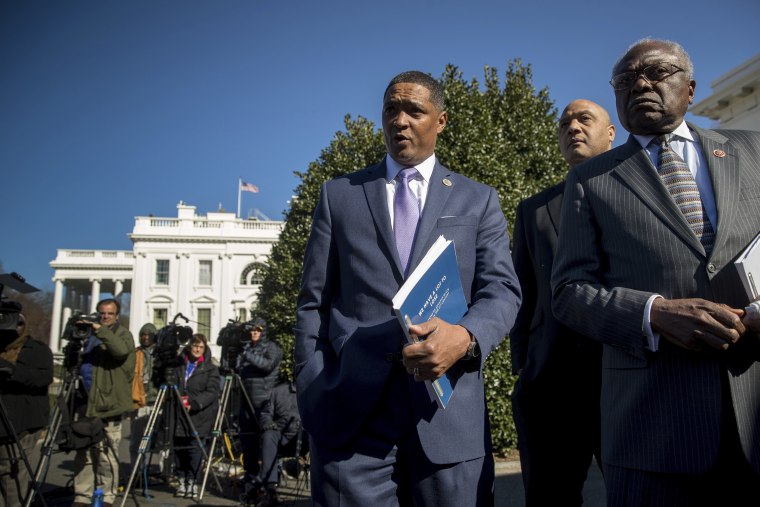 Image: Rep. Cedric Richmond, the chairman of the Congressional Black Caucus, accompanied Rep. Andre Carson, and Rep. Jim Clyburn, right, speak to members of the media after they and other members of the Co