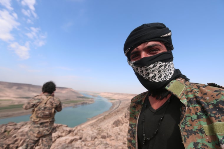 Image: An SDF fighter near Euphrates River, Raqqa