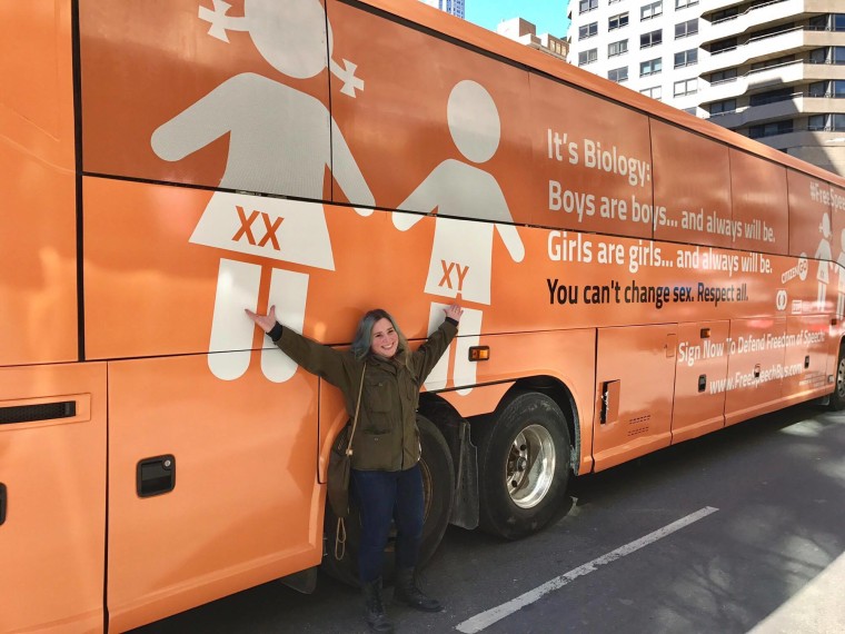 Transgender advocate Hannah Simpson in front of the "Free Speech Bus" in New York City on March 23, 2017