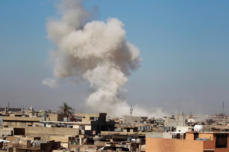 Image: Smoke rises over the city during clashes between Iraqi forces and Islamic State militants, in Mosul