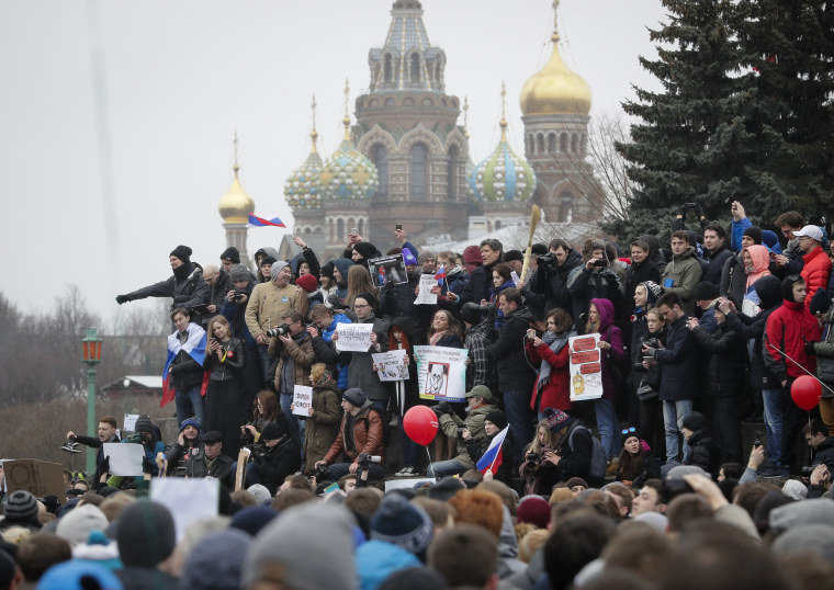 Image: Protesters gather at Marsivo Field in St. Petersburg.