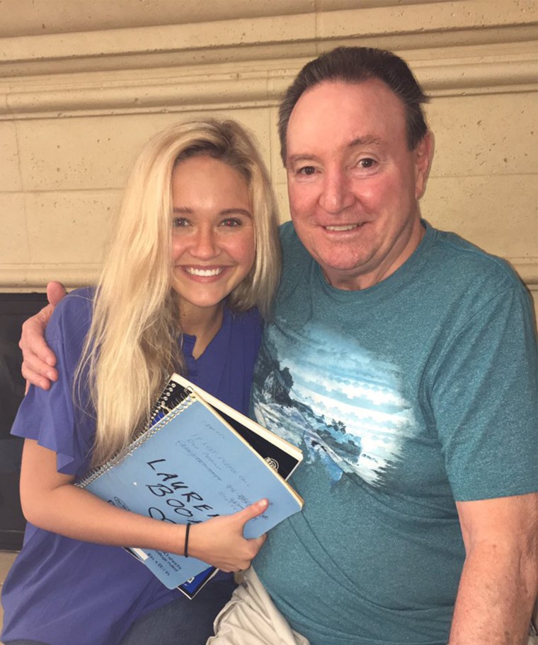 Ren and her grandpa with their journals of memories