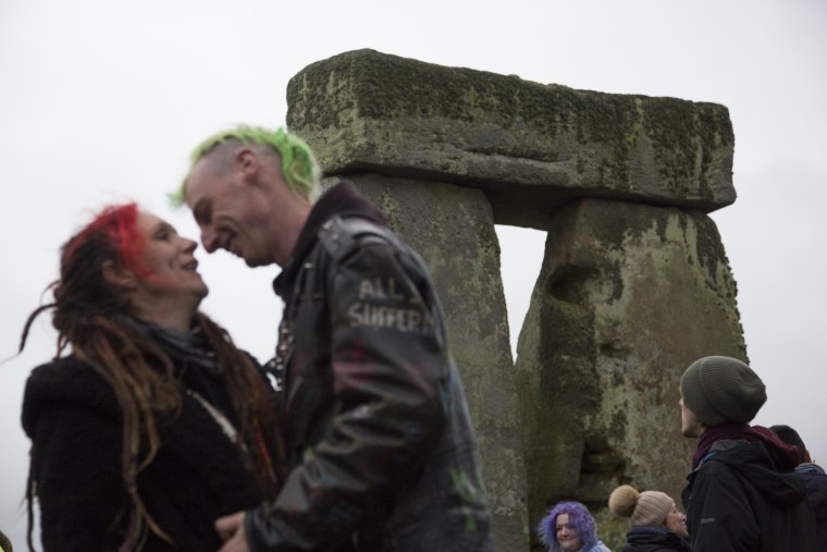 Image: A couple celebrates their symbolic marriage at Stonehenge