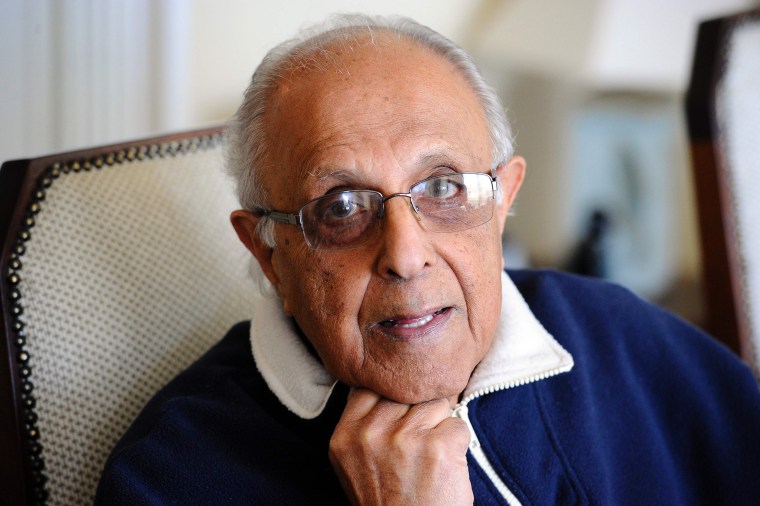 Image: Ahmed Kathrada, anti-apartheid activist and close friend of former South African President Nelson Mandela poses in his house in Johannesburg on July 16, 2012.