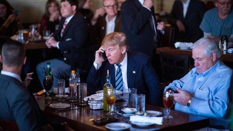 Donald Trump talks on the phone during his campaign trail in 2016.