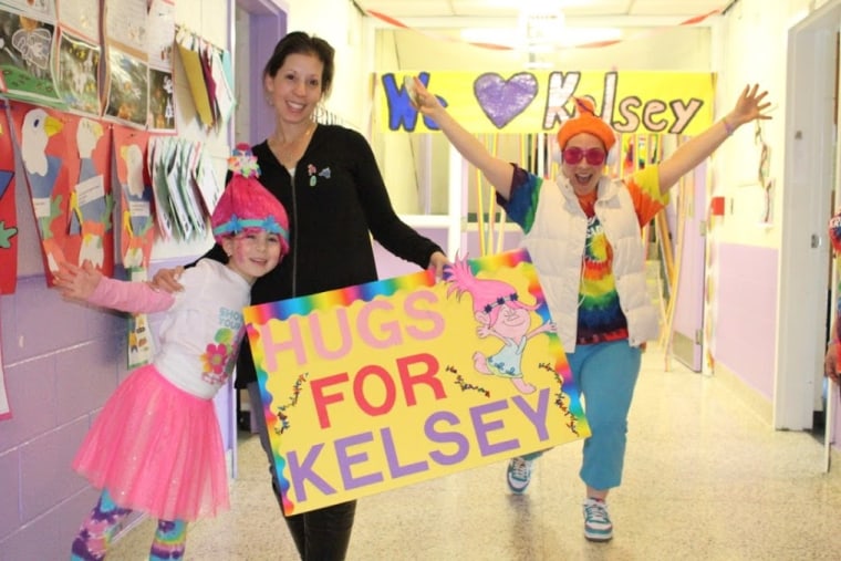 Student Alexa Doran with her mom, Laura Doran, and Kristen Covert, a first grade teacher at the school.