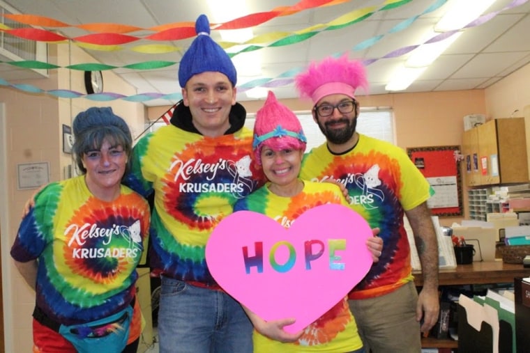 Superintendent Elsie Rodriguez (with "Hope" sign) told TODAY of her pride in the people who make up her school district. "Unfortunately, our district has had several students over the years who are inflicted with pediatric cancer," said Rodriguez. "It is our hope that the small things we do...make a difference."