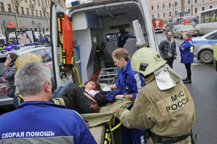 Image: An injured person is helped by emergency services