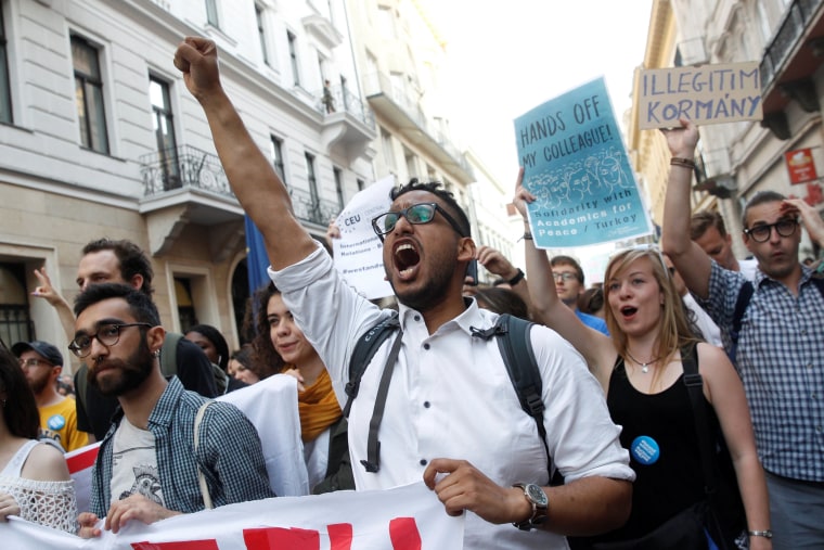 Image: Students shout slogans during a demonstration against Prime Minister Viktor Orban's efforts to force a George Soros-founded university out of the country in Budapest