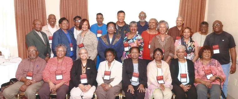 Syphilis study descendants seated for a picture.