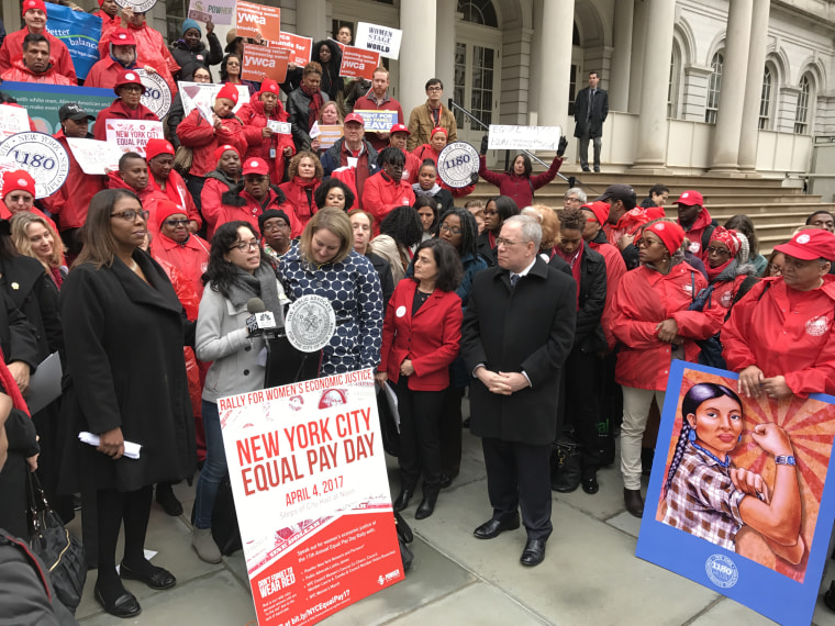 Retail worker Janika Reyes speaks out against on-call scheduling at Equal Pay Day rally.