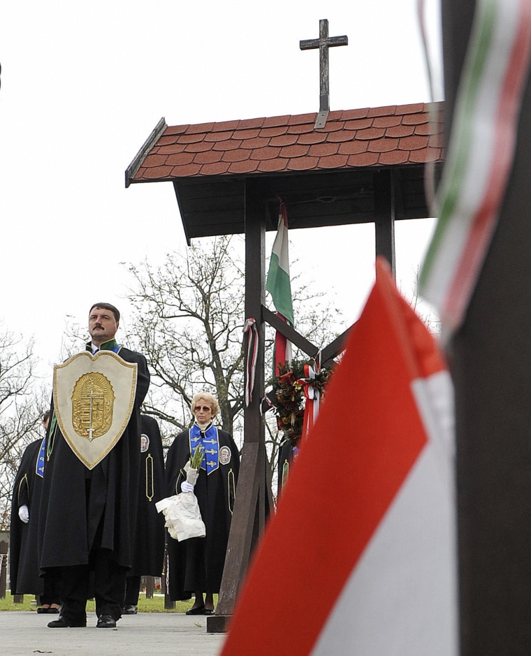 Image: Vitezi Rend members commemorate the 1956 anti-Soviet uprising