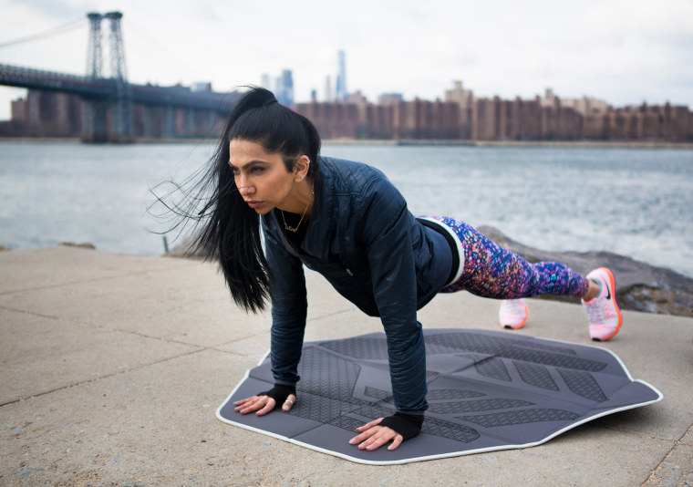 Image: A Muslim girl works out